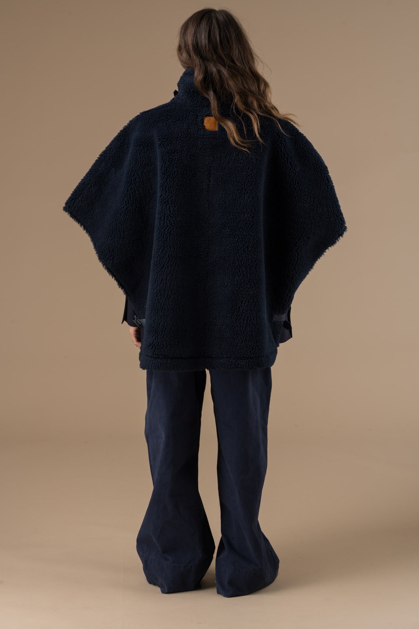 Manteau Olga fausse fourrure en mouton retourné