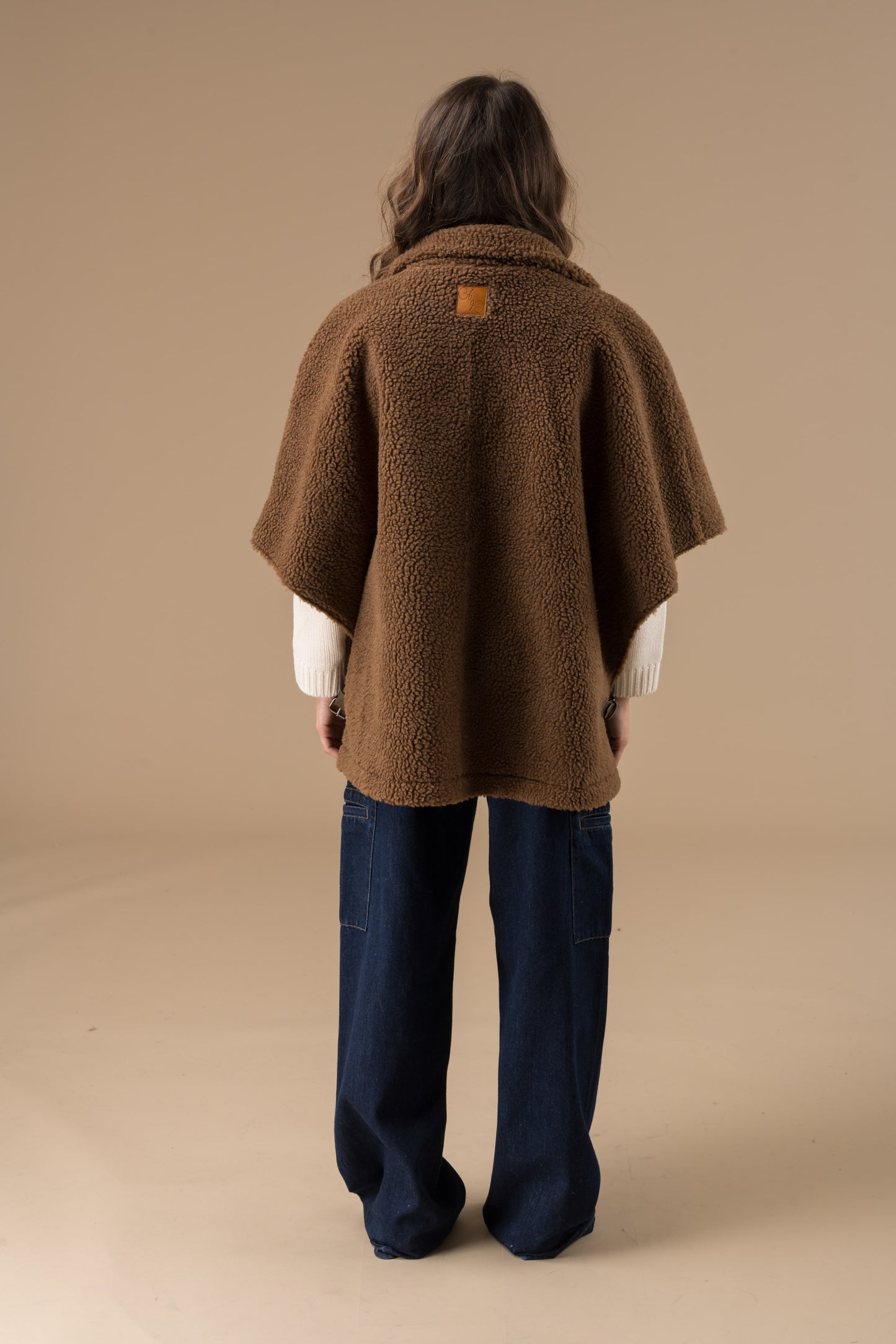 Manteau Olga fausse fourrure en mouton retourné