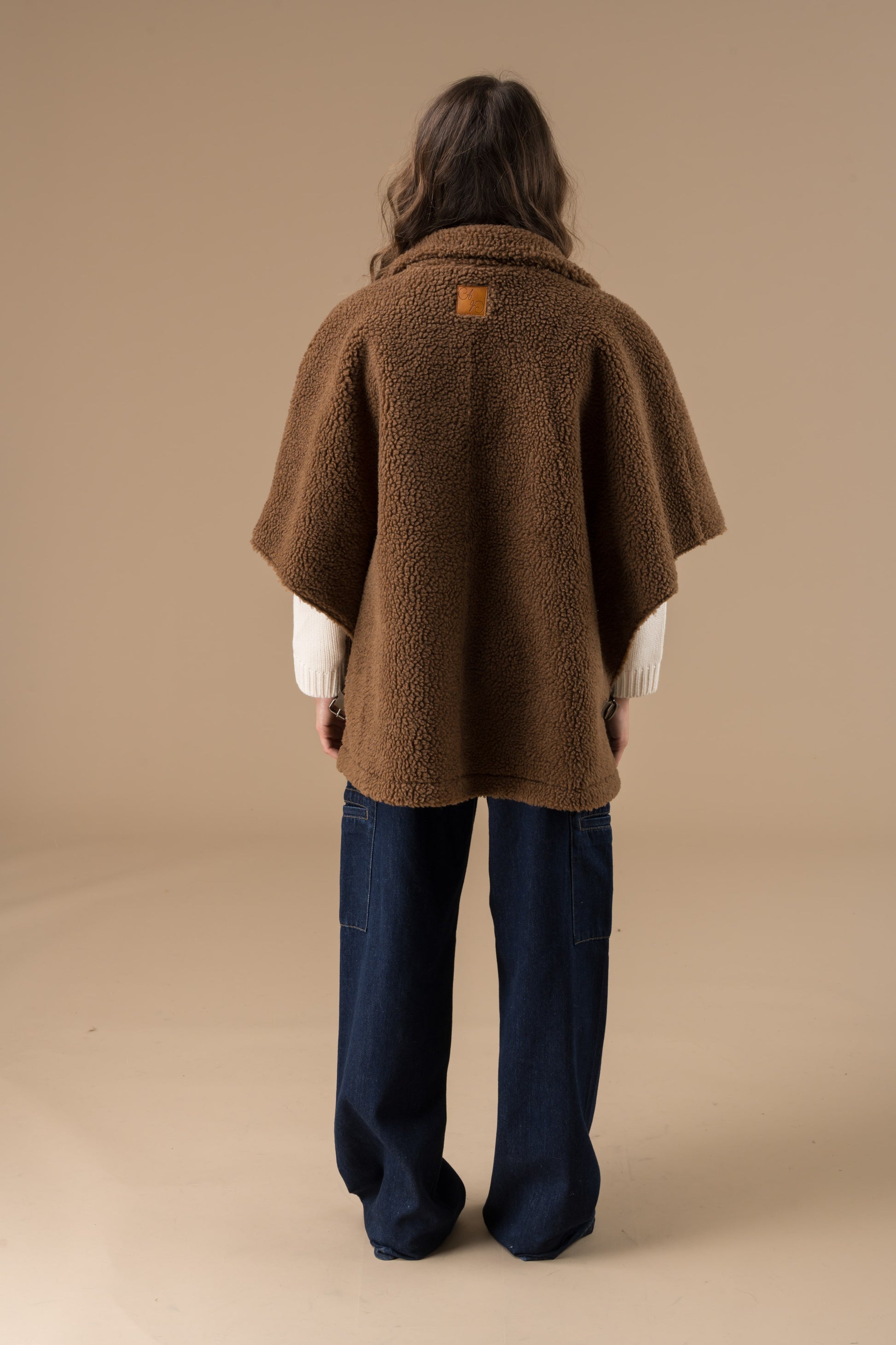 Manteau Olga fausse fourrure en mouton retourné
