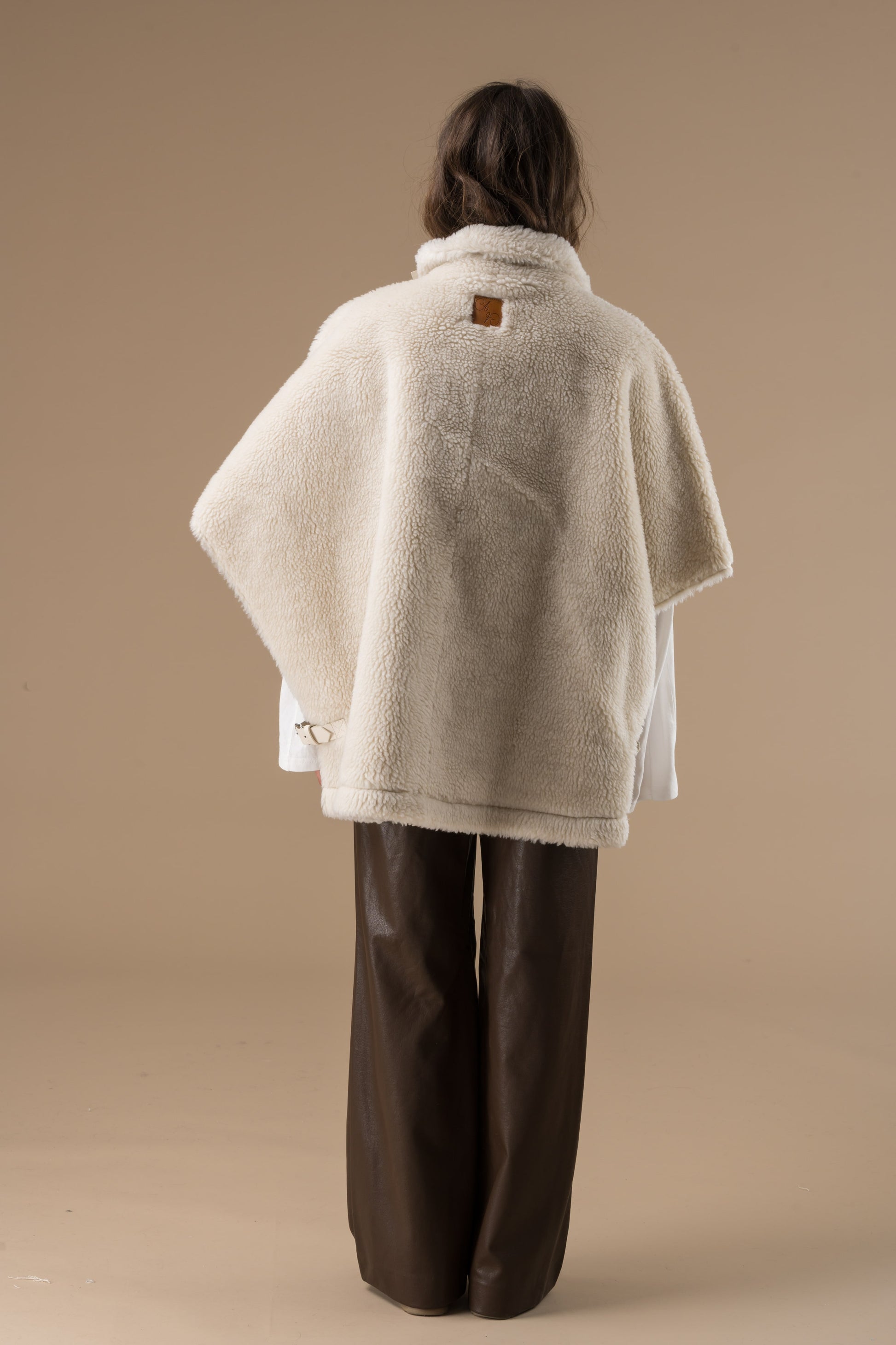Manteau Olga fausse fourrure en mouton retourné